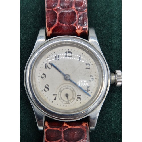 59 - Vintage Swiss Oyster [possibly Rolex] Gent's wrist watch, comes with a leather strap. Sweeping movem... 