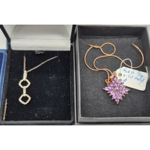 73 - A Collection of Silver chains and gem stone pendants; Emerald and diamond stone pendant, Citrine gem... 