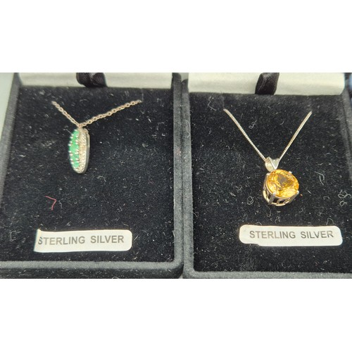73 - A Collection of Silver chains and gem stone pendants; Emerald and diamond stone pendant, Citrine gem... 