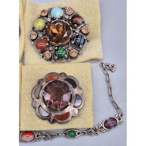 21 - A Collection of Scottish jewellery; Antique Sterling silver, agate and purple stone brooch, Three Mi... 