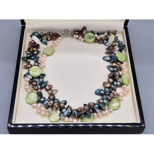 79 - Contemporary pearl and shell design three strand necklace. Sold on behalf of the Doddie Weir Charity... 