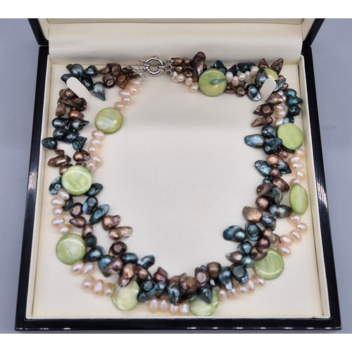 79 - Contemporary pearl and shell design three strand necklace. Sold on behalf of the Doddie Weir Charity... 