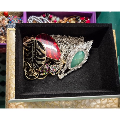 61 - A Crate of costume jewellery; jewellery boxed filled with various jewellery items