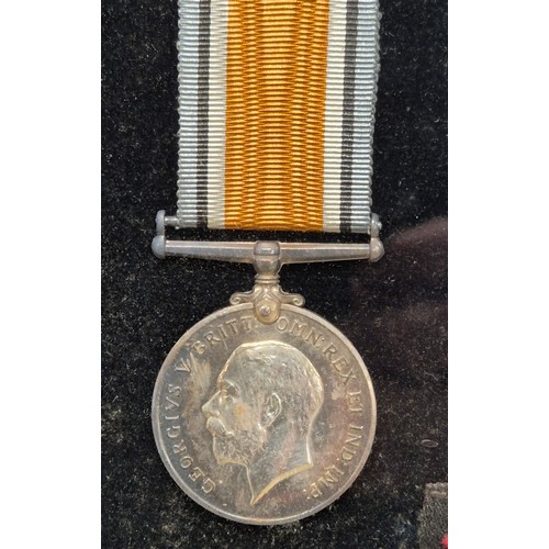 50 - Three Framed WWI Medals and Torpedo Badge belonging to James J. Michie. War Medal, Long Service meda... 