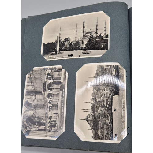 103 - A Large Antique Postcard Album Featuring North American & Middle Eastern Postcards [Pictured of enti... 