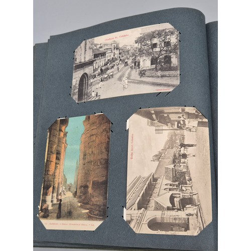 103 - A Large Antique Postcard Album Featuring North American & Middle Eastern Postcards [Pictured of enti... 