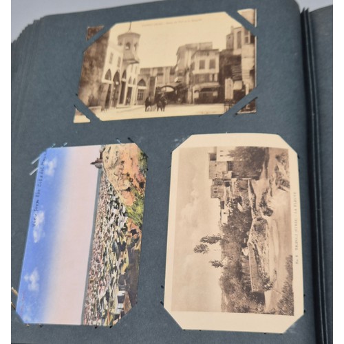 103 - A Large Antique Postcard Album Featuring North American & Middle Eastern Postcards [Pictured of enti... 