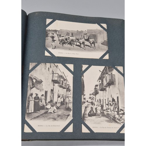 103 - A Large Antique Postcard Album Featuring North American & Middle Eastern Postcards [Pictured of enti... 