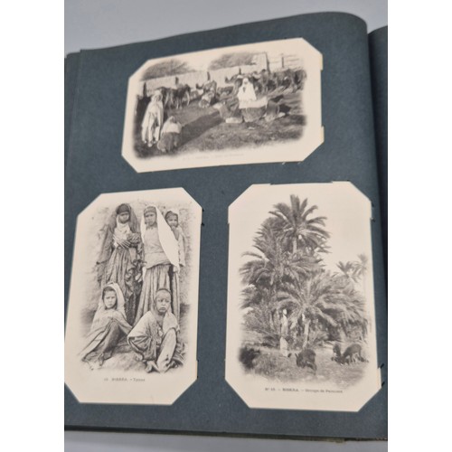 103 - A Large Antique Postcard Album Featuring North American & Middle Eastern Postcards [Pictured of enti... 