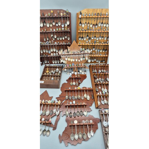 254 - A Large Collection of Souvenir Spoon racks and spoons.