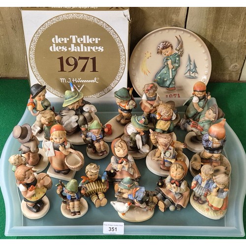 351 - A Large Collection of Goebel Hummel pottery figurines & collector plate boxed. [As found]