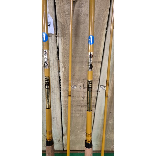 331 - Two Abu Suecia 7ft spinning rods with bags