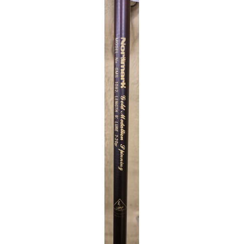 327 - Normark Gold Medallion 9ft spinning rod with bag