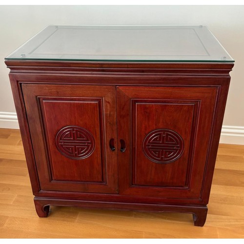 216 - Chinese Rosewood two door unit. Fold away doors leading to shelf interior. Has glass protector to to... 