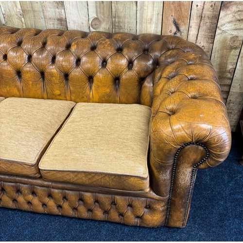 236 - Chesterfield three seat sofa, mustard leather fitted with three neutral material cushions. [70x195x8... 