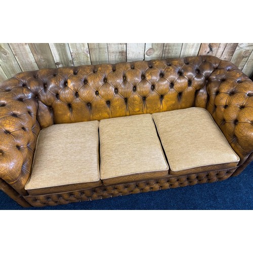 236 - Chesterfield three seat sofa, mustard leather fitted with three neutral material cushions. [70x195x8... 