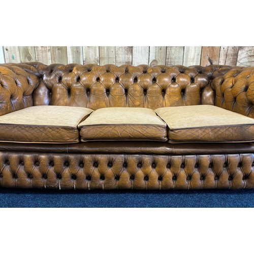 236 - Chesterfield three seat sofa, mustard leather fitted with three neutral material cushions. [70x195x8... 