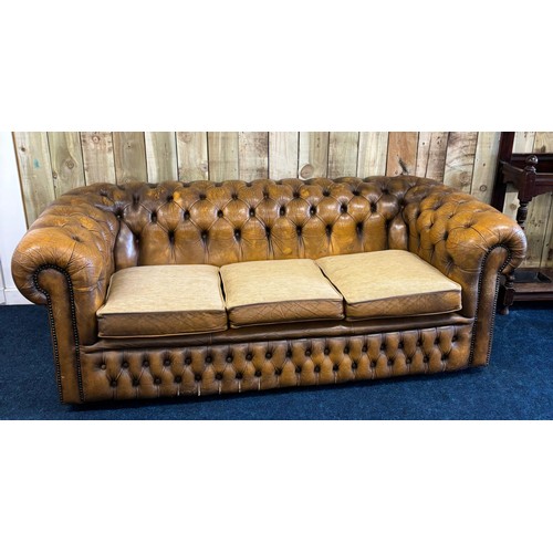 236 - Chesterfield three seat sofa, mustard leather fitted with three neutral material cushions. [70x195x8... 