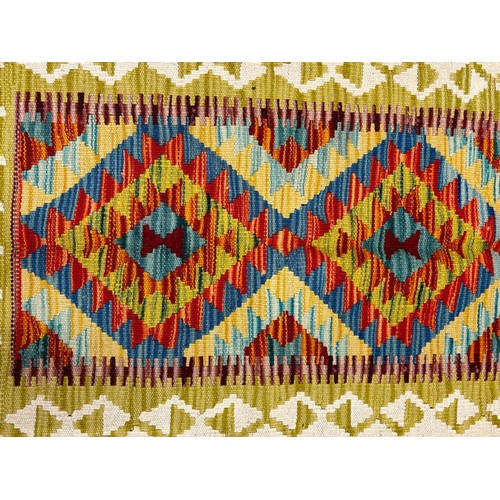 291 - Small Hand Knotted Chobi Kilim rug. {90x58cm}