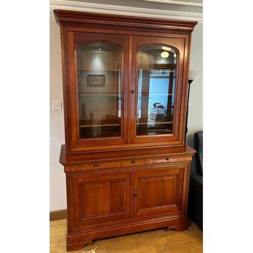 301 - French Grange cherry wood two section display cabinet. Moulded top section, two glass and cherry woo... 