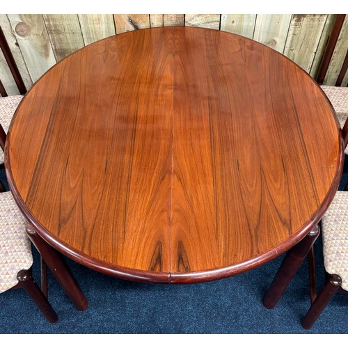 311 - Mid century Danish Skovby Rosewood dining table and four dining chairs, [74cm high, 114cm diameter]