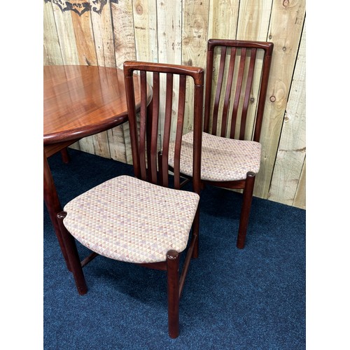 311 - Mid century Danish Skovby Rosewood dining table and four dining chairs, [74cm high, 114cm diameter]