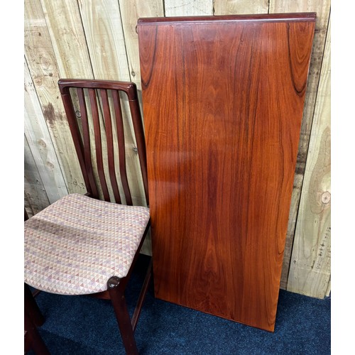 311 - Mid century Danish Skovby Rosewood dining table and four dining chairs, [74cm high, 114cm diameter]