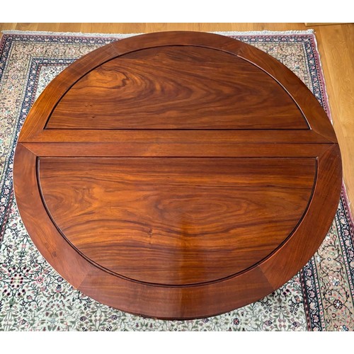 280 - Chinese rosewood dining table and four matching dining chairs. Glass protective top. Folds into a ci... 