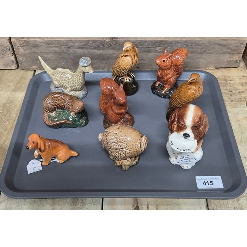 415 - Tray of collectable porcelain; Beswick Beneagles decanters- Loch Ness Monster, Haggis, Eagle, squirr... 