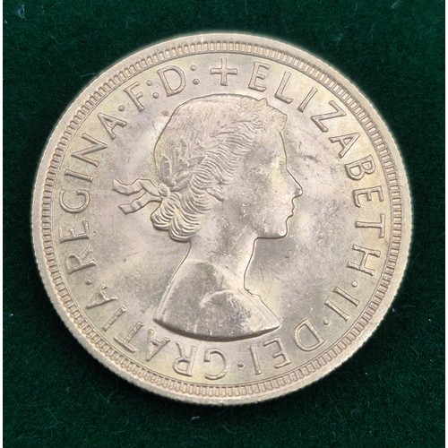 21 - 1957 Elizabeth II Full gold sovereign coin.