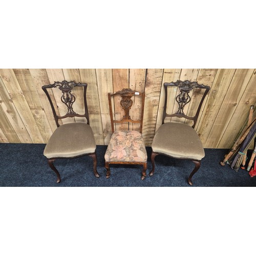 235 - A Collection of three 19th century carved back nursing chairs