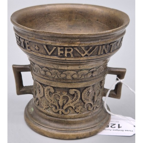 125 - Dutch Bronze two handle Mortar inscribed Leefte Verwint Al Dinck Anno 1590. [9.5cm high]