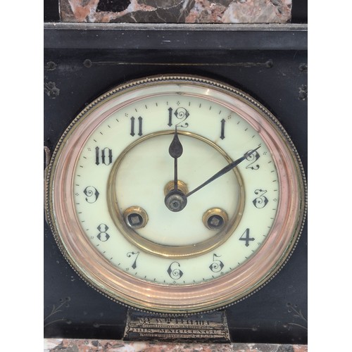 185 - 19th century slate mantle clock. Fitted with marble inserts. Comes with pendulum. [29x30x13cm]