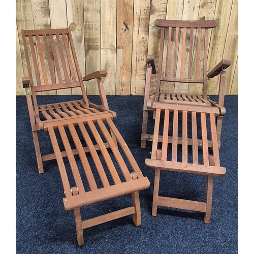 335 - A Pair of Teak Patio Deck folding sun Lounger arm chairs