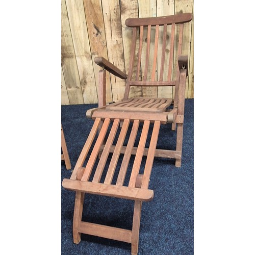 335 - A Pair of Teak Patio Deck folding sun Lounger arm chairs