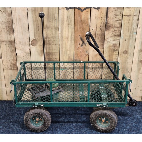 501 - Heavy duty garden Four wheel Cart with handle. including cast iron boot scraper.