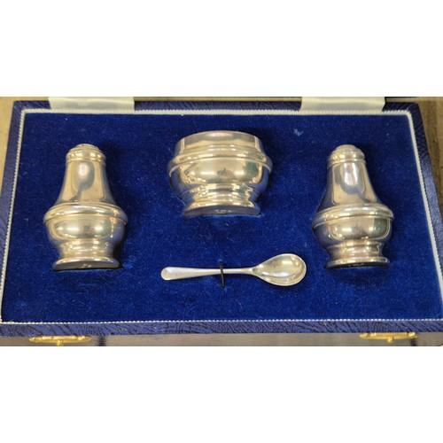 71 - Boxed Birmingham silver three piece condiment set with spoon. Produced by Lawrence R Watson. [53.52g... 