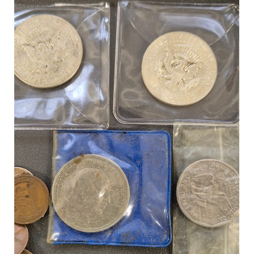 98 - A Tub of mixed world coins. Contains mostly American coins. Six J.F. Kennedy Half Dollar coins- 5x 1... 