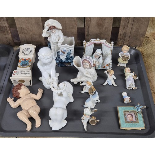 143 - Two Tray's of collectable figures and tile: Dickens series figures, Beswick dog, Wee Willie cat scul... 