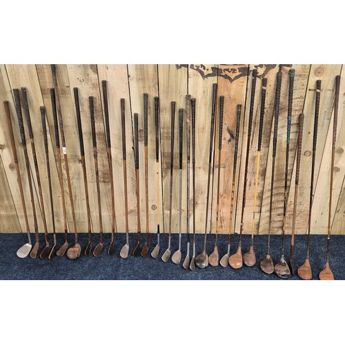 505 - A Collection of hickory shaft golf clubs: P. Forcan & Son St Andrews and various other makes.