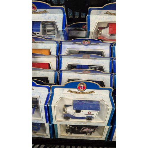 368 - A crate of Oxford Die Cast advertising van models [all boxed]