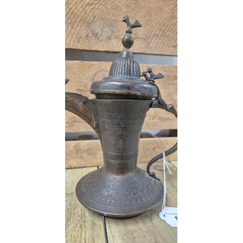 146 - Antique Arabic Middle Eastern brass coffee pot. [24cm high]