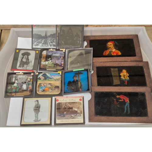 153 - Two trays of Collectables 19th century and early 20th century slides; Colour story slides. Three mov... 