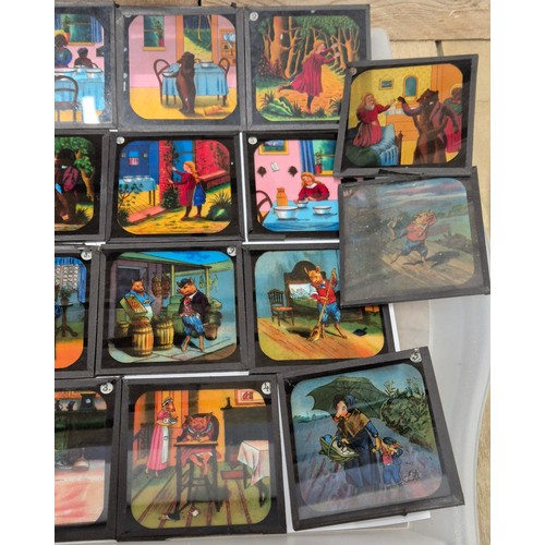 153 - Two trays of Collectables 19th century and early 20th century slides; Colour story slides. Three mov... 