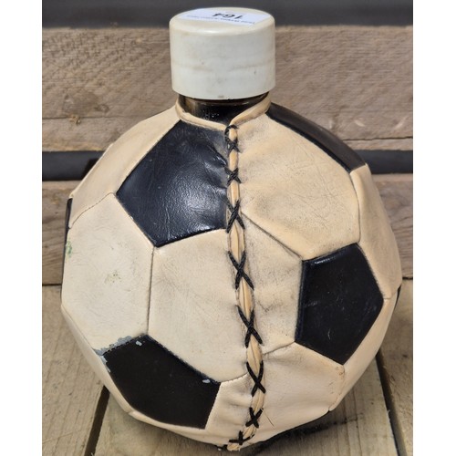 164 - A Bottling of spirit kept within a football decanter.