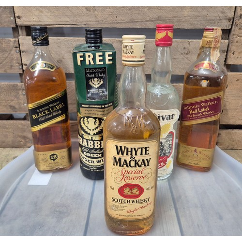 163 - Five bottlings of vintage whisky and spirits: Johnnie Walker Black and Red Label- 1 Litre, Whyte & M... 