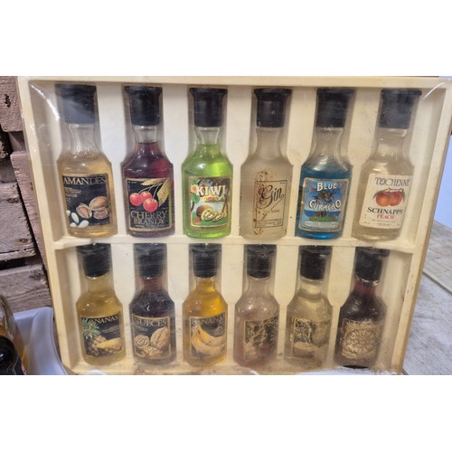 165 - Tray of collectable miniature spirits; Boxed Marie Brizard, Windjammer, Vodka, Port and many others.