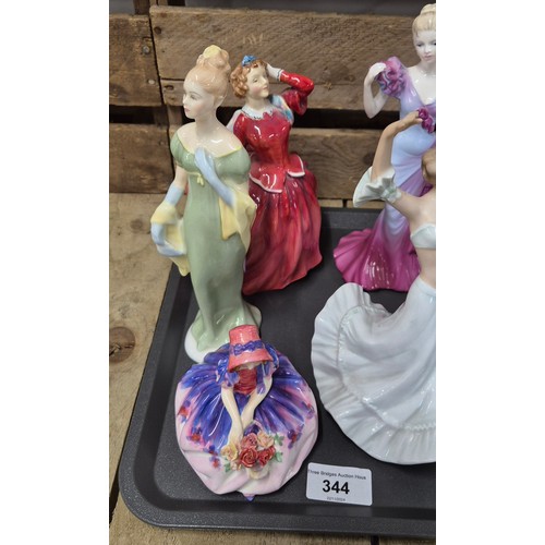 344 - A tray of collectable porcelain figures; Royal Doulton figure Blithe morning, Lorna Hn2311, Monica H... 