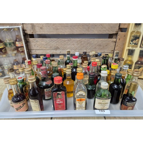 165 - Tray of collectable miniature spirits; Boxed Marie Brizard, Windjammer, Vodka, Port and many others.