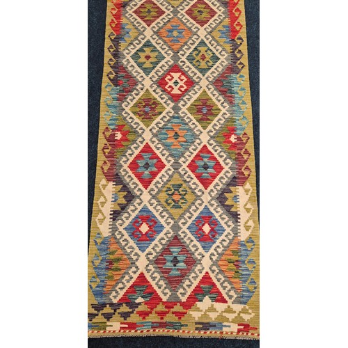 289 - Hand knotted Chobi Kilim runner rug. [254x85cm]